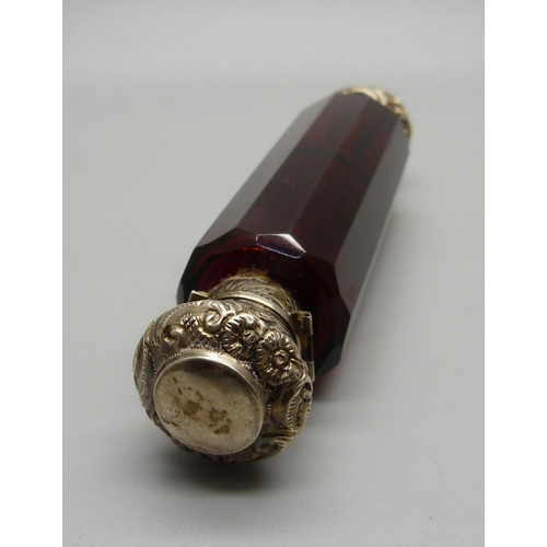 855 - A ruby glass double scent bottle, (hinge a/f, top dented)