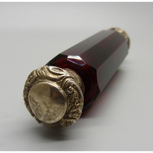 855 - A ruby glass double scent bottle, (hinge a/f, top dented)