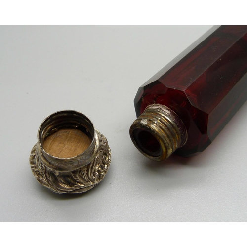 855 - A ruby glass double scent bottle, (hinge a/f, top dented)