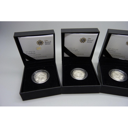 857 - Four The Royal Mint 2010/2011 £1 silver proof coins, London, Belfast, Edinburgh and Cardiff