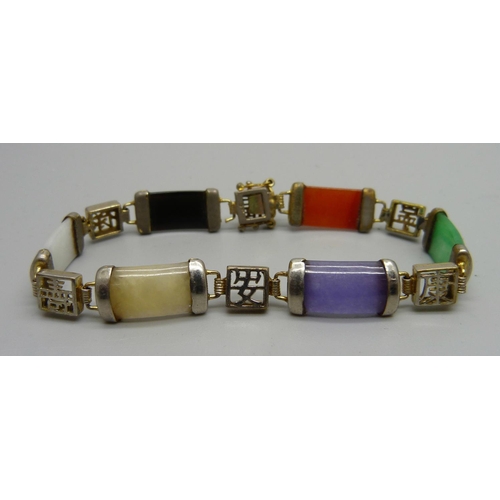 866 - A multi-coloured jade bracelet and an oriental seal, seal a/f