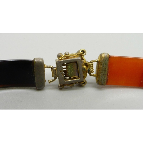 866 - A multi-coloured jade bracelet and an oriental seal, seal a/f