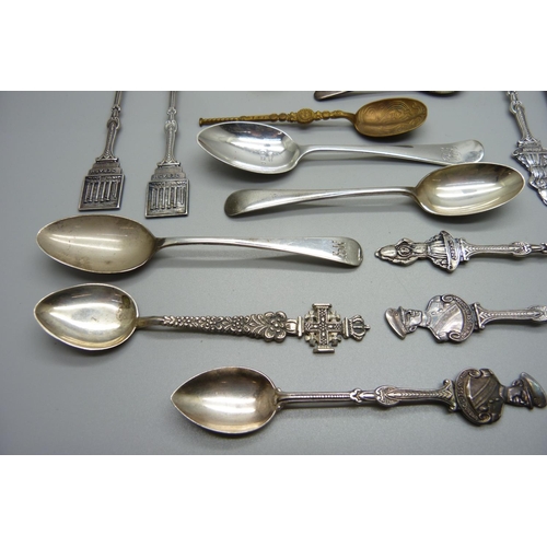 869 - Four silver spoons, 68g, seven spoons marked .800, 98g, and three other spoons