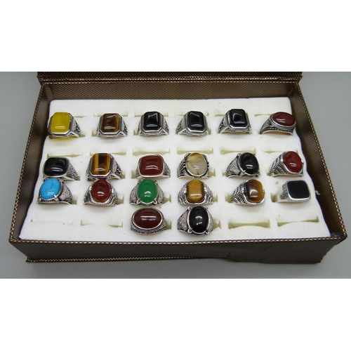 878 - Twenty copper and silver plated gemstone rings