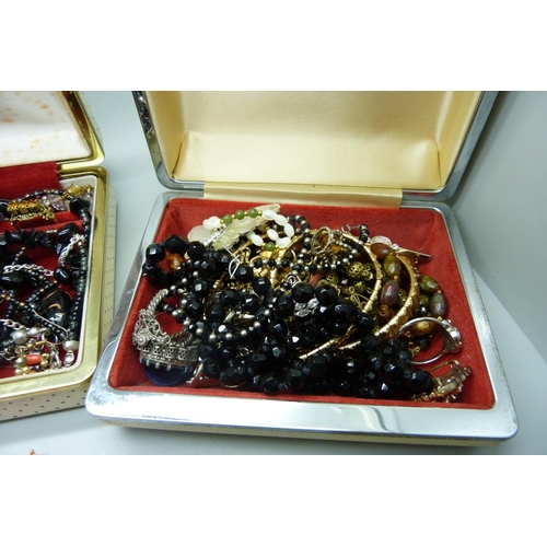 890 - A collection of costume jewellery, (in three boxes)