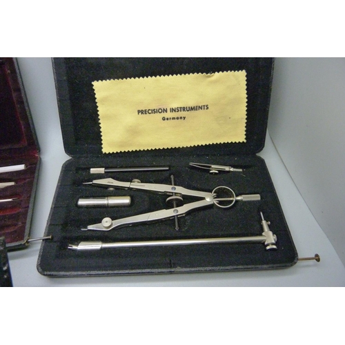 891 - Three vintage precision drawing instruments, cased, (one part set)