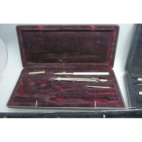 891 - Three vintage precision drawing instruments, cased, (one part set)