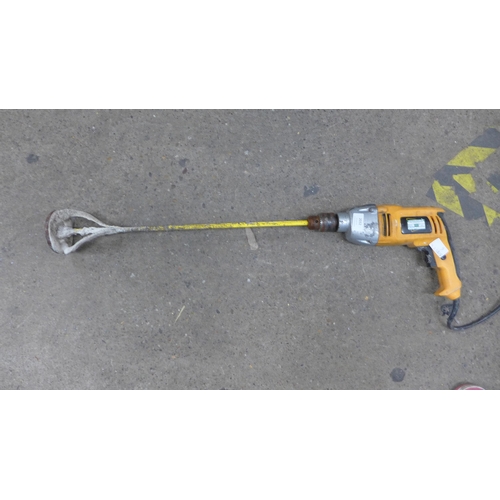 2032 - A JCB 1010w 240v hammer drill with mixing paddle attached