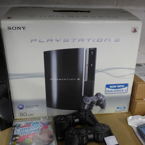 2076 - A Playstation 3 console with 5 games including Little Big Planet and Motorstorm and two Playstation ... 