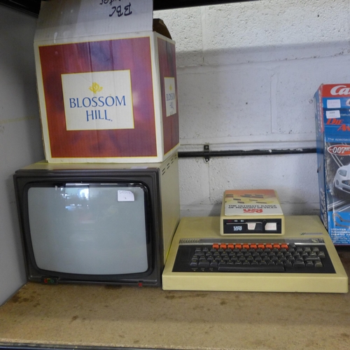 2097 - A vintage BBC computer with monitor, disk drive and  47 game and software discs