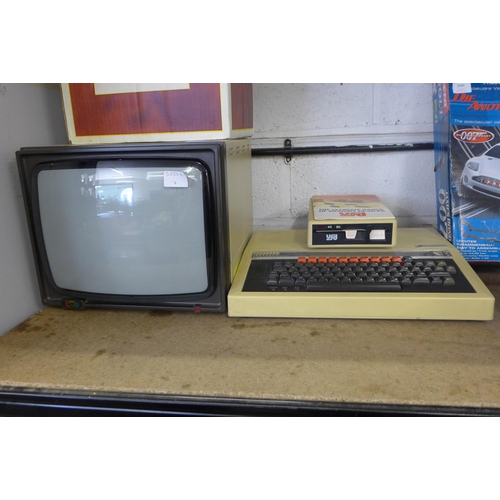 2097 - A vintage BBC computer with monitor, disk drive and  47 game and software discs