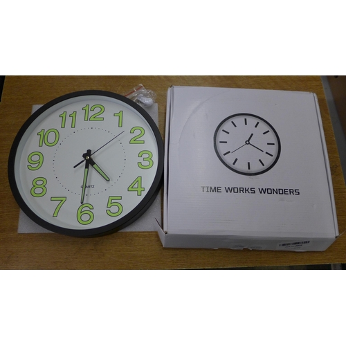 2098 - 3 Round battery operated wall clocks, 30cm diameter - unused