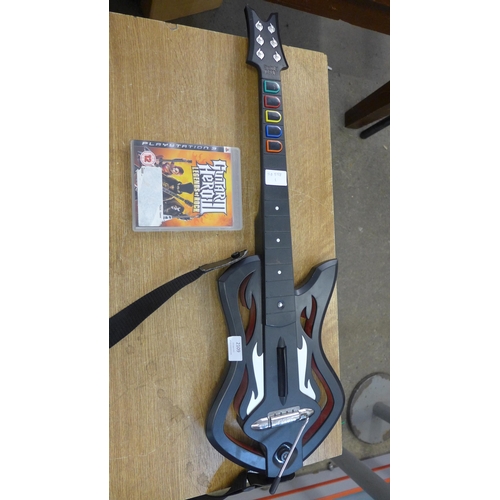 2109 - Guitar Hero 3 Legends of Rock and a Guitar Hero controller