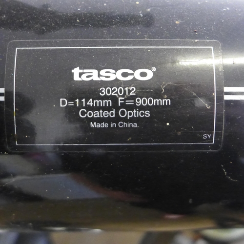 2210 - A Tasco D-114mm f-900mm coated optics telescope with tripod stand