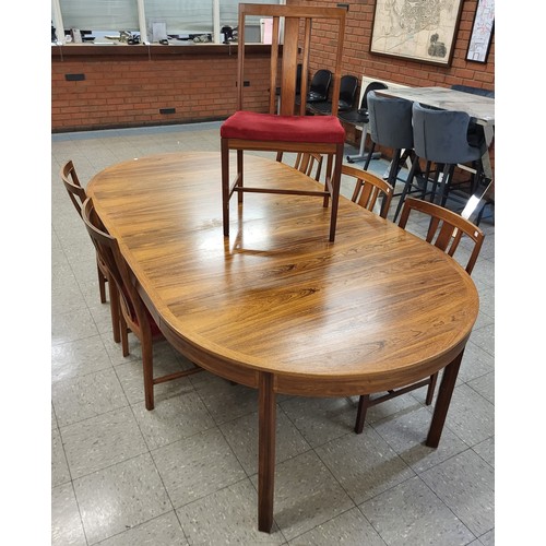 10B - A Swedish Bodafors rosewood extending dining table and six chairs, designed by Bertil Fridhagen. CIT... 