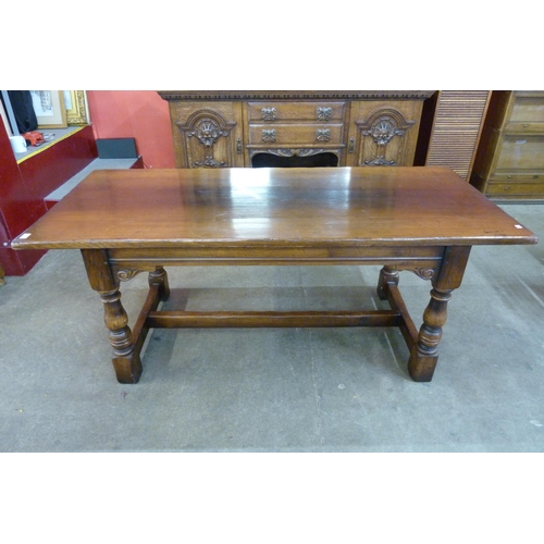 100 - A 17th Century style Ipswich oak refectory table, 75cms h, 183cmsnl, 82cms w