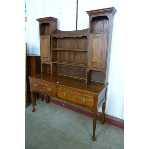 123 - A George III style oak dresser