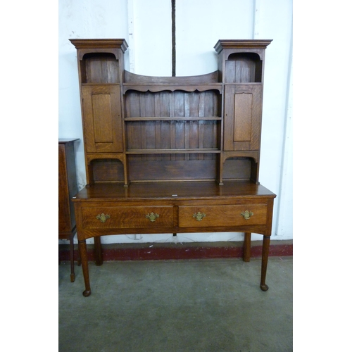 123 - A George III style oak dresser