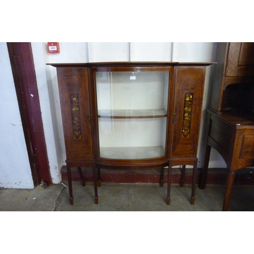 124 - An Edward VII inlaid mahogany bow front side cabinet