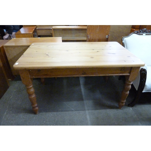 128 - A waxed pine farmhouse kitchen table