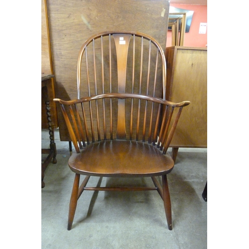 136 - An Ercol Golden Dawn elm and beech Chairmaker's armchair