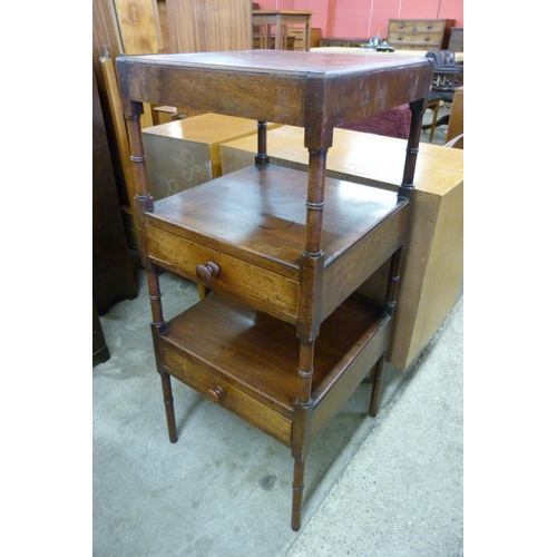 144 - A George IV mahogany three tier whatnot