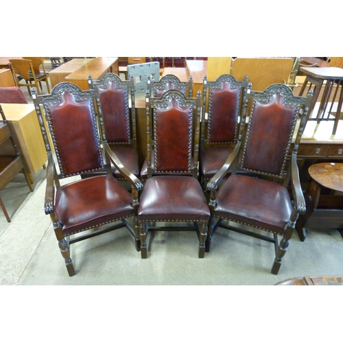 145 - A set of six Jaycee carved oak and burgundy leather dining chairs