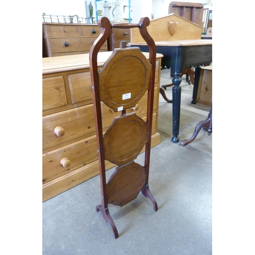 158 - A mahogany folding cake stand