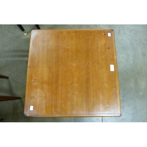 16 - A teak coffee table