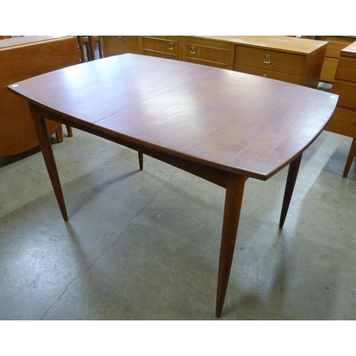 18 - A White & Newton afromosia extending dining table