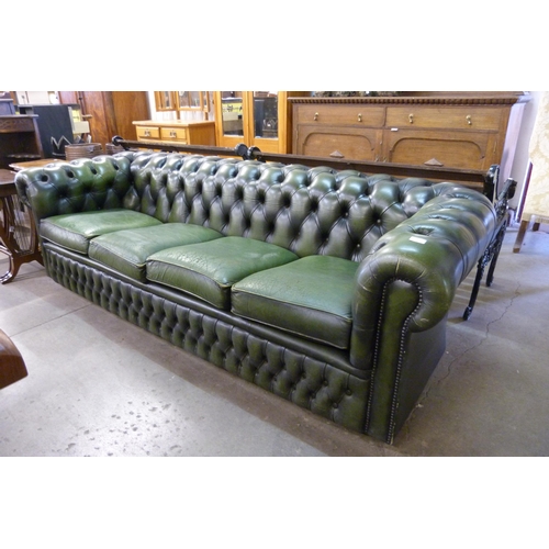 183 - A green leather Chesterfield settee