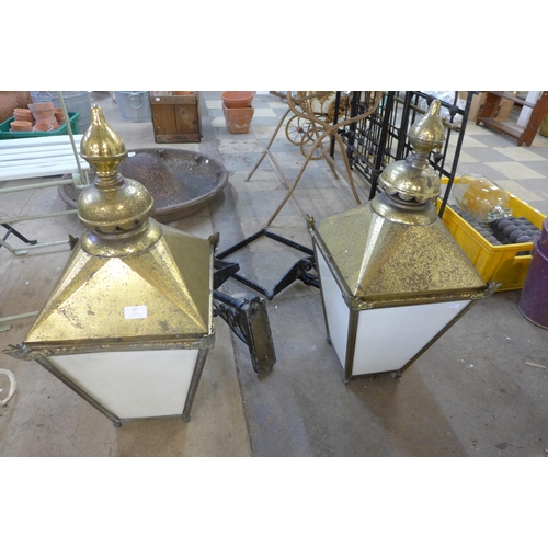 227 - A pair of Victorian style brass street lanterns and brackets