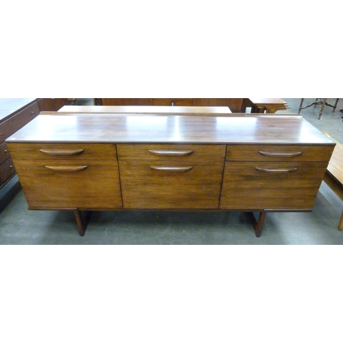 24 - A teak sideboard