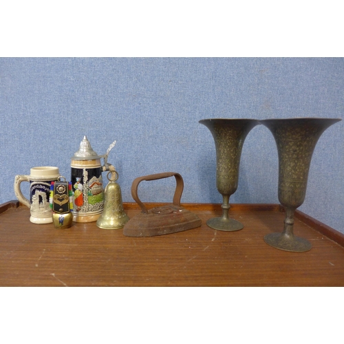 291 - A pair of Islamic brass vases, two small German stoneware steins, etc.