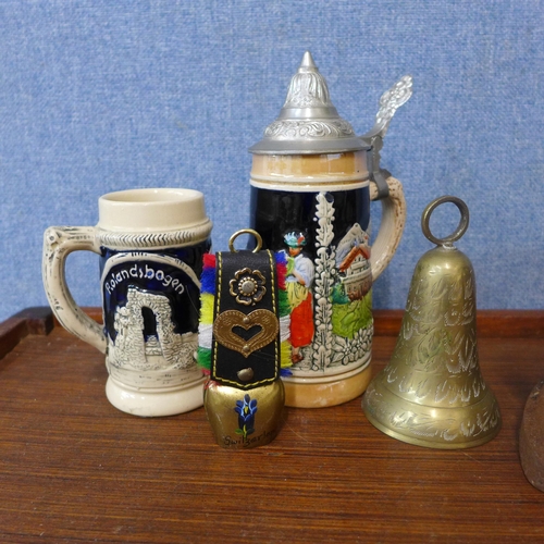 291 - A pair of Islamic brass vases, two small German stoneware steins, etc.