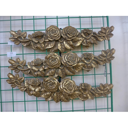 296 - A set of three French gilt floral appliques