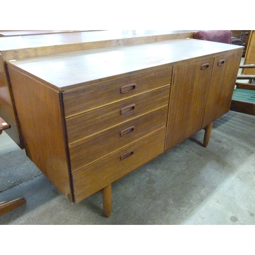 30 - A tola wood sideboard