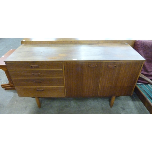 30 - A tola wood sideboard