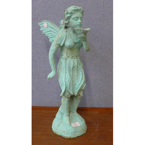 306 - A cast iron garden figure of a pixie