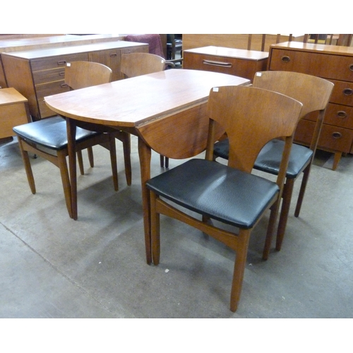 31 - A teak drop-leaf table and four chairs