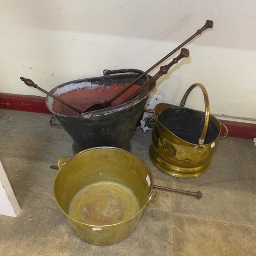 310 - A brass jam pan, a coal scuttle, brass fender, etc.