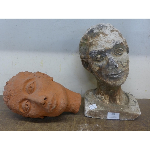 317 - A terracotta lady's head and a faux stone lady's head