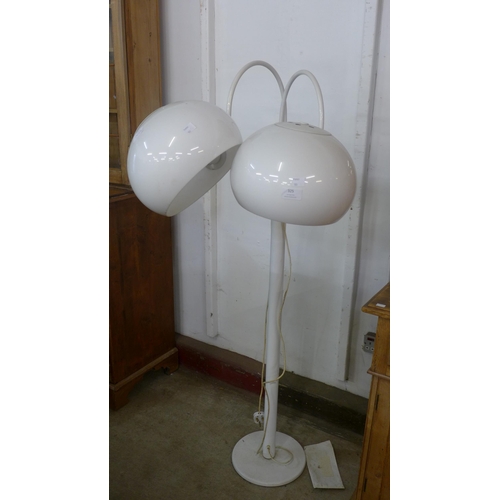 325 - A white Perspex floor standing lamp