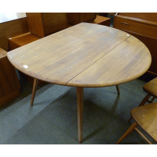 42 - An Ercol elm and beech Windsor drop-leaf table