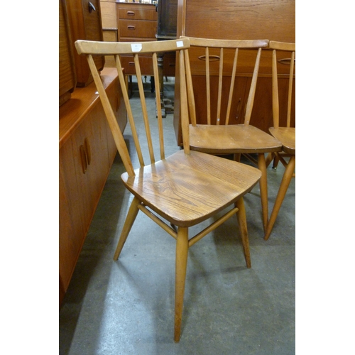 43 - A set of four Ercol elm and beech 391 model chairs