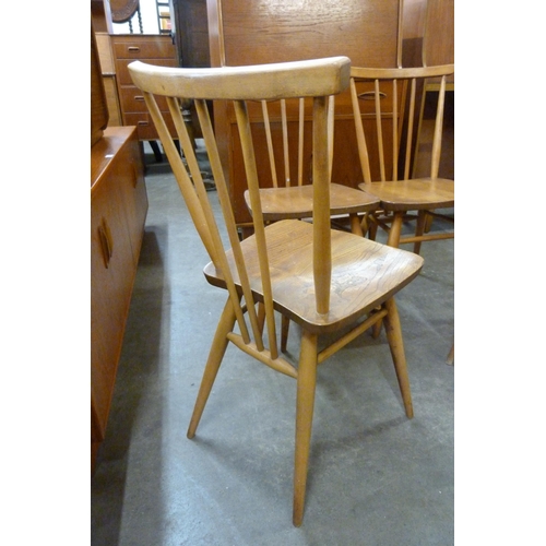 43 - A set of four Ercol elm and beech 391 model chairs