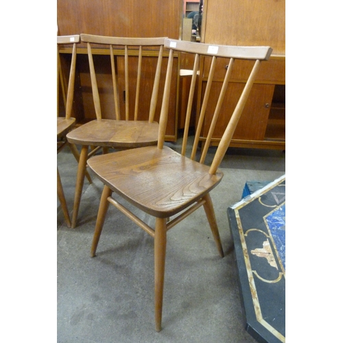 44 - A set of four Ercol elm and beech 391 model chairs