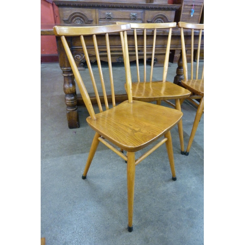 45 - A set of four Ercol elm and beech 391 model chairs