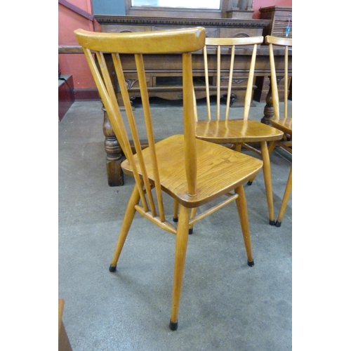 45 - A set of four Ercol elm and beech 391 model chairs