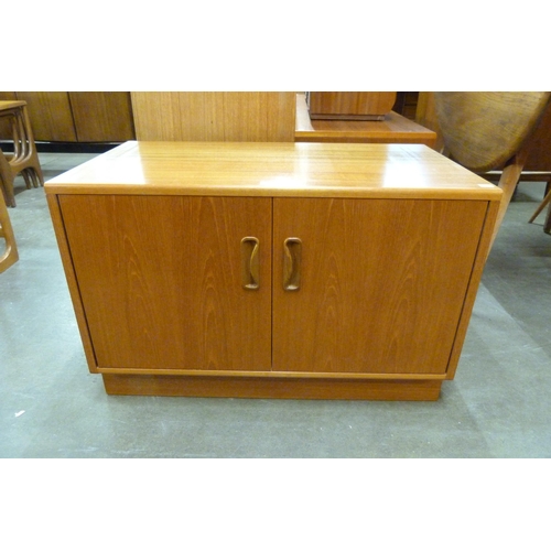 49 - A G-Plan Fresco teak two door cupboard